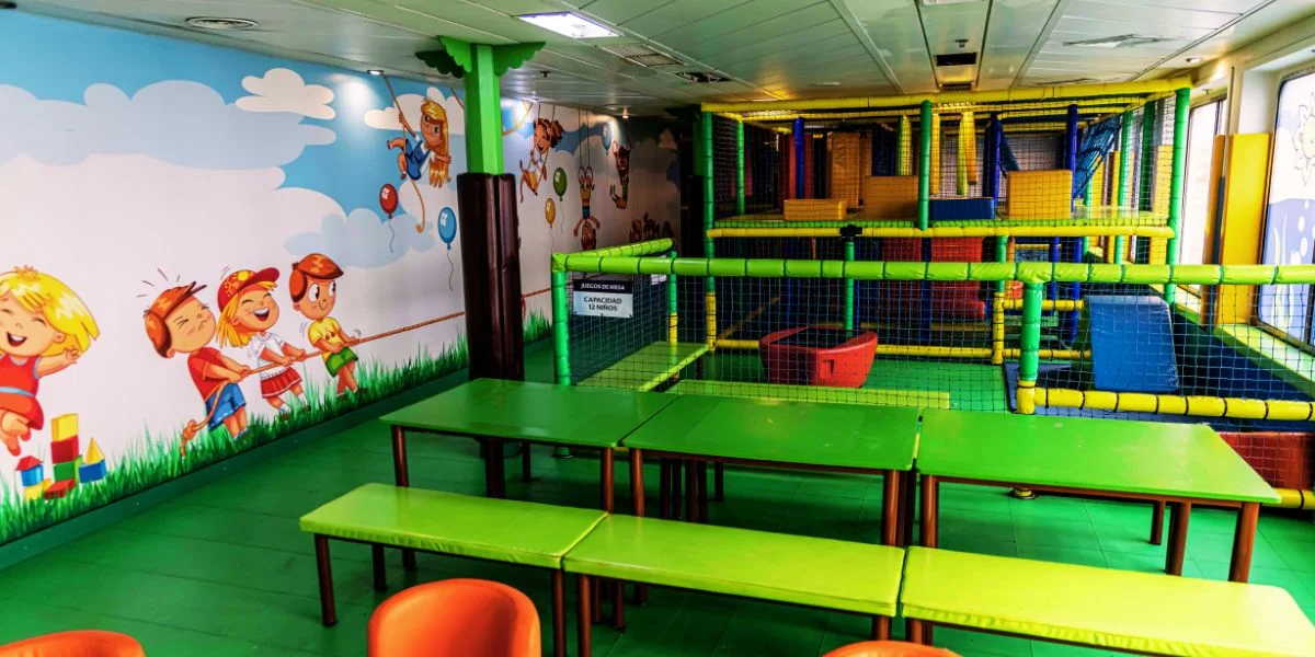 Children's area with tables and a playground.