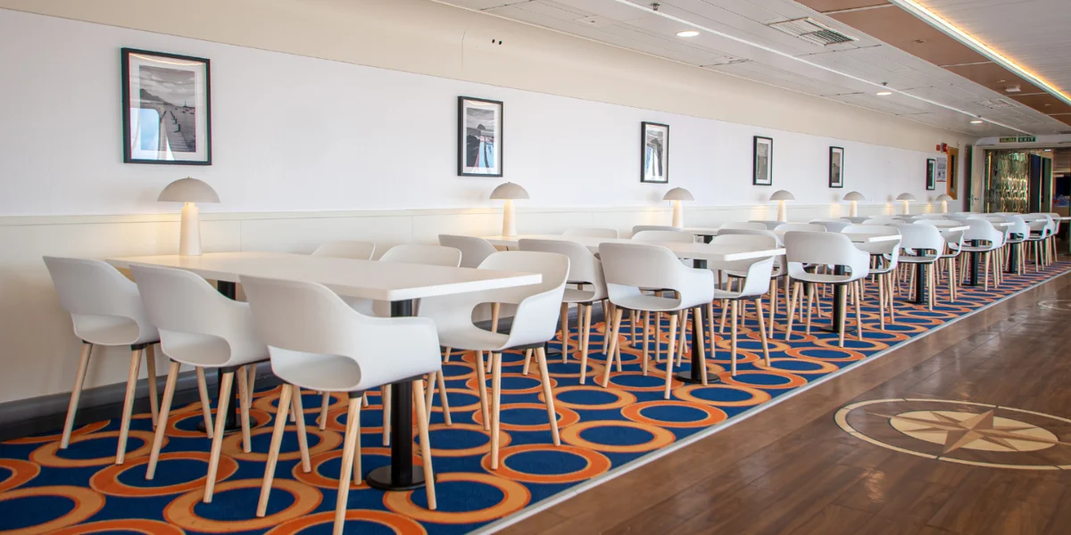 Tables and chairs in the dining area.